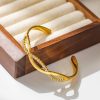 O1CN011l9sis25wjY1LHh0E_3529117591-0-cib.jpg Stainless Steel Zirconia Twist Bangle 855905674874