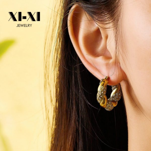 O1CN012mgSN225wjblE4hMM_3529117591-0-cib.jpg Stainless Steel Teardrop Twist Earrings 735568471212