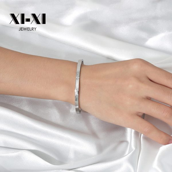 O1CN013HKmGD25wjbp42ms9_3529117591-0-cib.jpg Stainless Steel Cross Rhinestone Bangle 633562234513