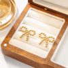 O1CN015UARST25wjY6bf2S9_3529117591-0-cib.jpg Stainless Steel Bow Stud Earrings 857848674393