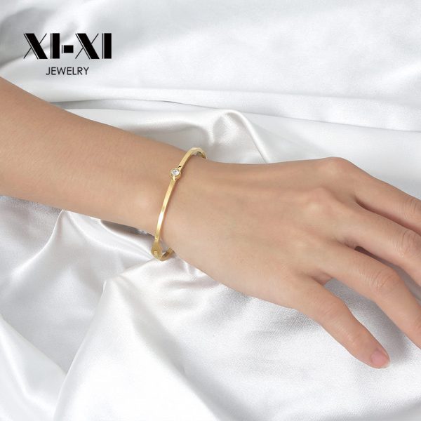 O1CN015gOCnU25wjbq0CY1V_3529117591-0-cib.jpg Stainless Steel Single Stone Bangle 633776515247