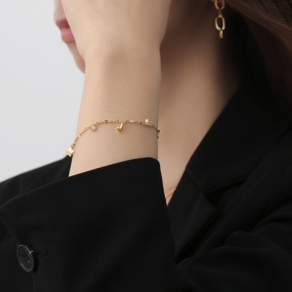 O1CN018eHaPh25wjDq4xmTM_3529117591-0-cib.jpg Stainless Steel Star Moon Bracelet 647343140240