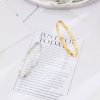 O1CN01ECrtVT25wjKW61z1N_3529117591-0-cib.jpg Stainless Steel Rhinestone Bangle 692307657250