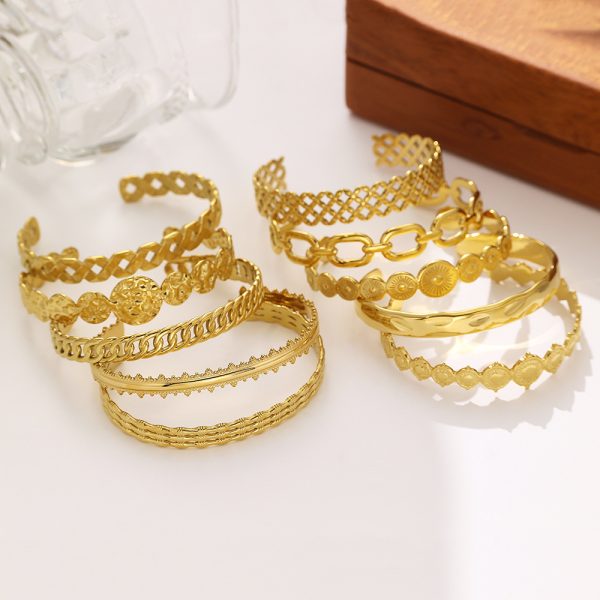 O1CN01FPGEFE25wjTQTuLiv_3529117591-0-cib.jpg Stainless Steel C Shaped Bangle Set 776028358390