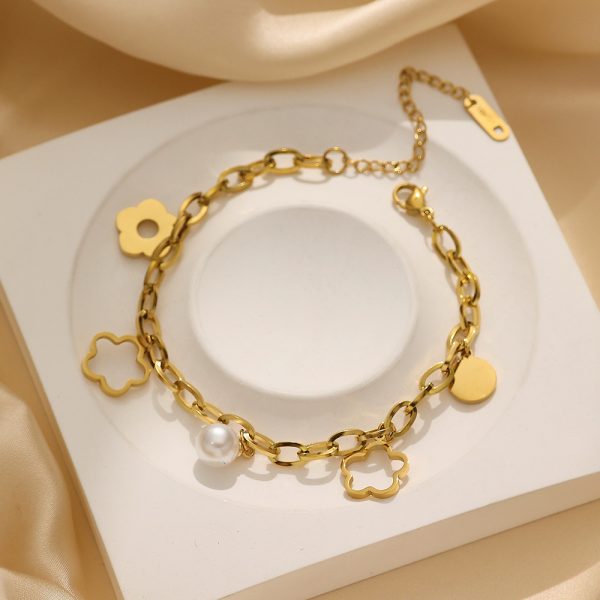 O1CN01L4quNK25wjUigbArg_3529117591-0-cib.jpg Stainless Steel Pearl Flower Bracelet 798767193233