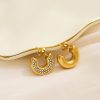 O1CN01LTXIb925wjNz2nNJ5_3529117591-0-cib-3.jpg Stainless Steel Rhinestone Crescent Earrings 724369464612