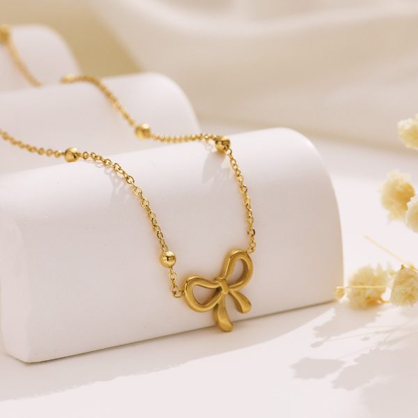 O1CN01MhndOZ25wjVI8psr8_3529117591-0-cib.jpg Stainless Steel Bow Necklace 809793137298