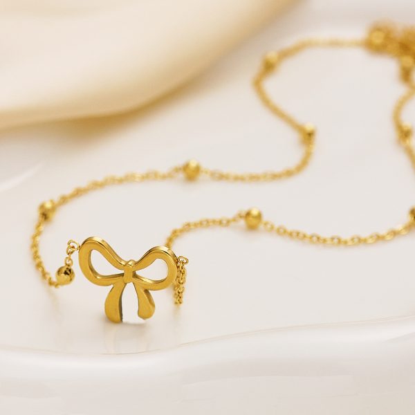 O1CN01OAryzh25wjVEBKSgE_3529117591-0-cib.jpg Stainless Steel Bow Necklace 809793137298