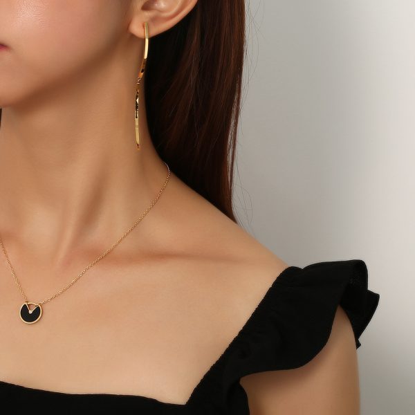 O1CN01OUGjQ025wjE9UNNjc_3529117591-0-cib.jpg Stainless Steel Curved Drop Earrings 649841737898