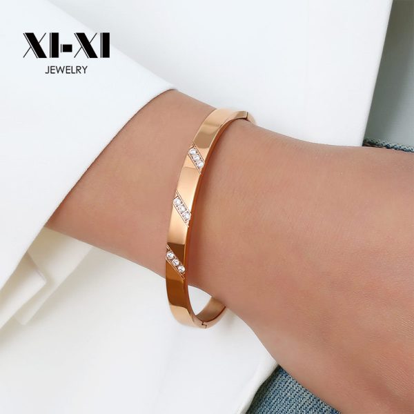 O1CN01PyCmGr25wjbfJjZmT_3529117591-0-cib.jpg Stainless Steel Three Stone Bangle 634911226588