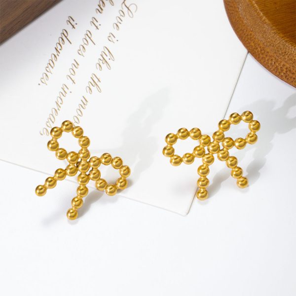 O1CN01Q6ULBm25wjY2GDeP2_3529117591-0-cib.jpg Stainless Steel Bow Stud Earrings 857848674393