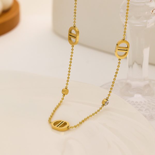 O1CN01TdcKMM25wjTht0TE6_3529117591-0-cib.jpg Stainless Steel CD Letter Necklace 778672660110