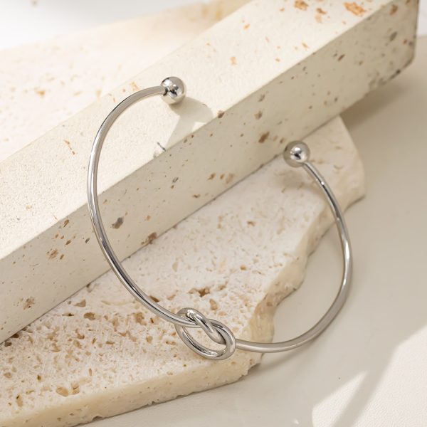 O1CN01Tu2lTy25wjbdB8Gla_3529117591-0-cib.jpg Stainless Steel Knot Open Bangle 948808921290