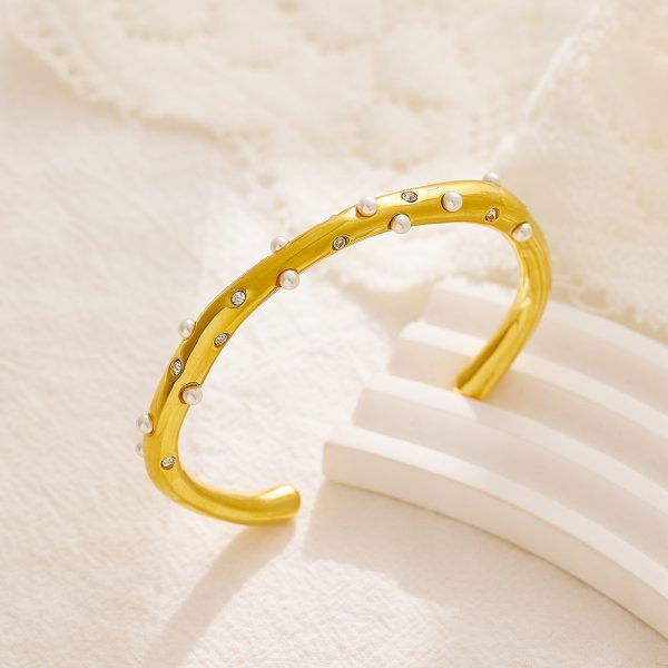 O1CN01U1OFw525wjOXKx6KM_3529117591-0-cib.jpg Stainless Steel Pearl Bangle 729698293194