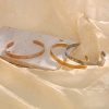 O1CN01UP0HLn25wjd87LfkZ_3529117591-0-cib.jpg Stainless Steel Open Zirconia Bangle 984088168533