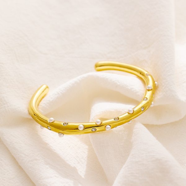 O1CN01VvMsKo25wjOXKvUX7_3529117591-0-cib.jpg Stainless Steel Pearl Bangle 729698293194