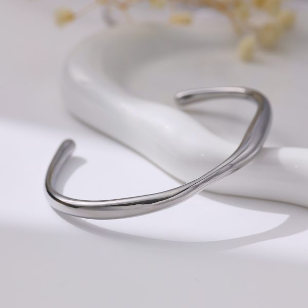 O1CN01WlIeeE25wjTgw92v6_3529117591-0-cib.jpg Stainless Steel Irregular Open Bangle 778420846694