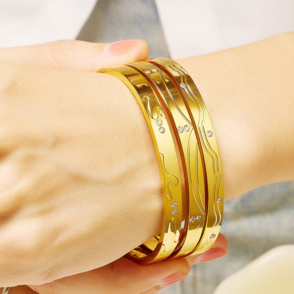 O1CN01XdZfcm25wjQdq3qQ3_3529117591-0-cib.jpg Stainless Steel Irregular Zirconia Bangle 747296879314