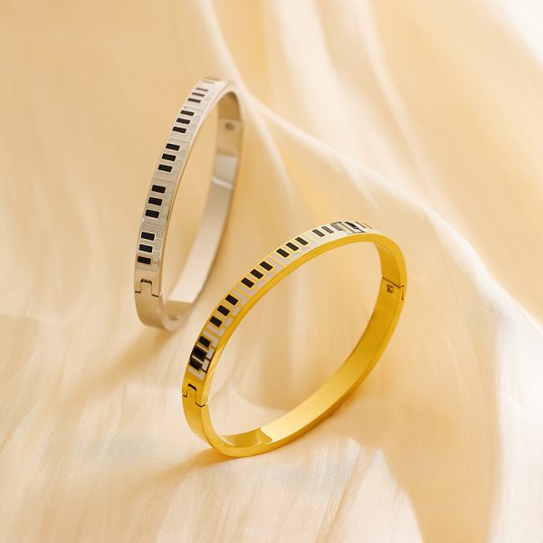 O1CN01ZL9b8u25wjNqJYcxe_3529117591-0-cib.jpg Stainless Steel Piano Bangle 724036232626