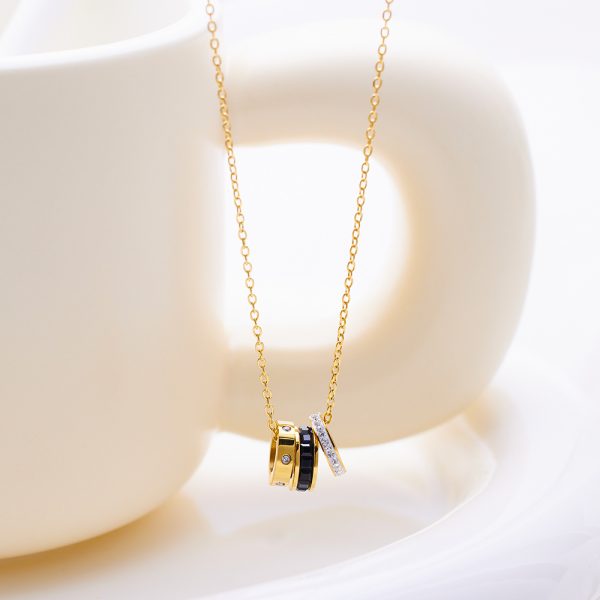 O1CN01aE1Yuv25wjUIHLOqy_3529117591-0-cib.jpg Stainless Steel Rhinestone Triple Ring Necklace 788159998027