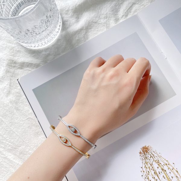 O1CN01bNERdM25wjIHkCoKc_3529117591-0-cib.jpg Stainless Steel Evil Eye Pave Bangle 675880076317