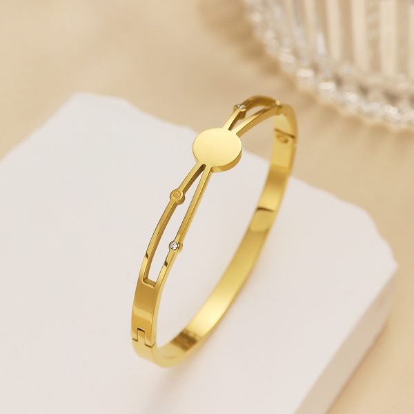 O1CN01bX1yW425wjUsmZdsP_3529117591-0-cib.jpg Stainless Steel Disc Bangle 805537668092