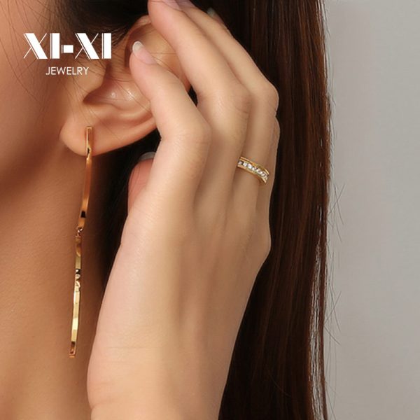 O1CN01cnOVfQ25wjbk9tu4L_3529117591-0-cib.jpg Stainless Steel Curved Drop Earrings 649841737898