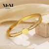 O1CN01h8rh1q25wjbudMmzY_3529117591-0-cib.jpg Stainless Steel Disc Bangle 805537668092