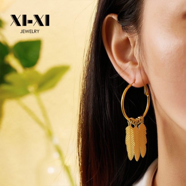 O1CN01jDk6nI25wjbpGTqQe_3529117591-0-cib.jpg Stainless Steel Leaf Tassel Earrings 770255723979