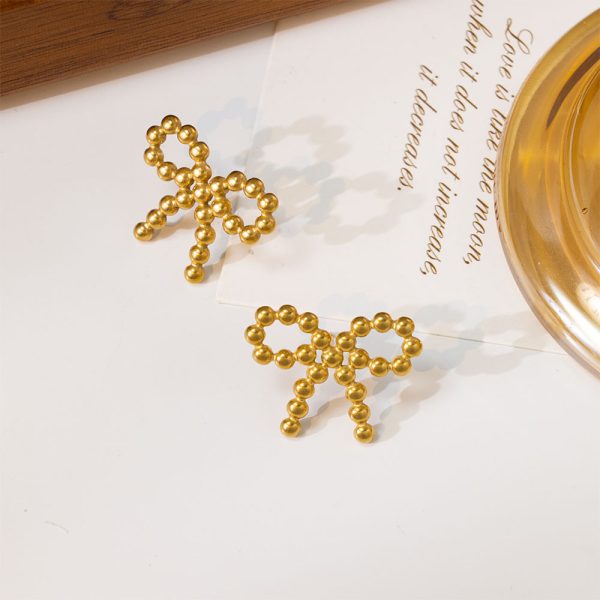 O1CN01oO82TL25wjY8mPrOo_3529117591-0-cib.jpg Stainless Steel Bow Stud Earrings 857848674393
