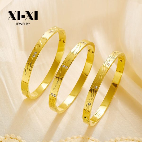 O1CN01q8liFV25wjbqwKuKe_3529117591-0-cib.jpg Stainless Steel Irregular Zirconia Bangle 747296879314