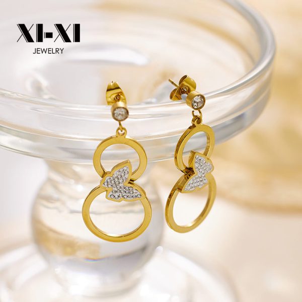 O1CN01qSiQBs25wjblv1ypN_3529117591-0-cib.jpg Stainless Steel Disc Drop Earrings 750654442128