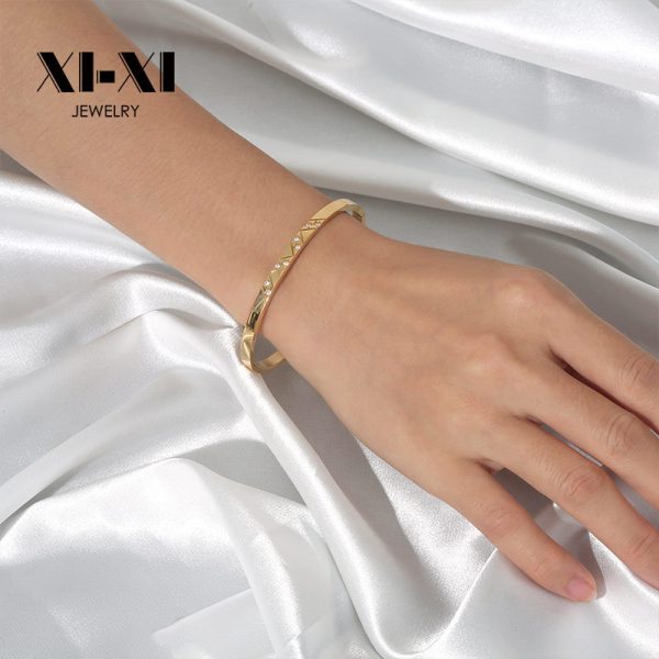 O1CN01sM6kdj25wjbkLWqiQ_3529117591-0-cib.jpg Stainless Steel Grid Pattern Bangle 650725303704