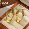 O1CN01sTAx9825wjbqtCddI_3529117591-0-cib.jpg Stainless Steel Wavy Hoop Earrings 775451833636