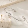O1CN01t2tUFz25wjbcw7B22_3529117591-0-cib.jpg Stainless Steel Knot Open Bangle 948808921290