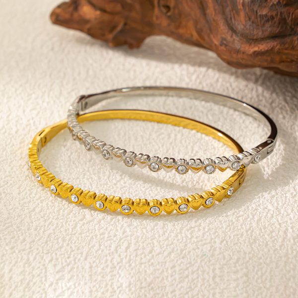 O1CN01ub9eIE25wjc7NKurL_3529117591-0-cib.jpg Stainless Steel Zirconia Heart Bangle 958497159610