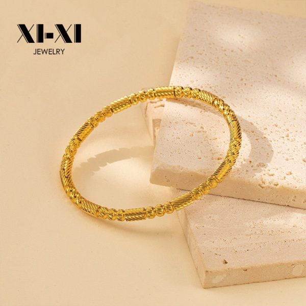 O1CN01wMnQrq25wjbtVcAsc_3529117591-0-cib.jpg Stainless Steel Textured Bead Bangle 894394207110