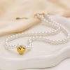 O1CN01x7vIh125wjVIV40jf_3529117591-0-cib.jpg Stainless Steel Pearl Heart Necklace 809918922800
