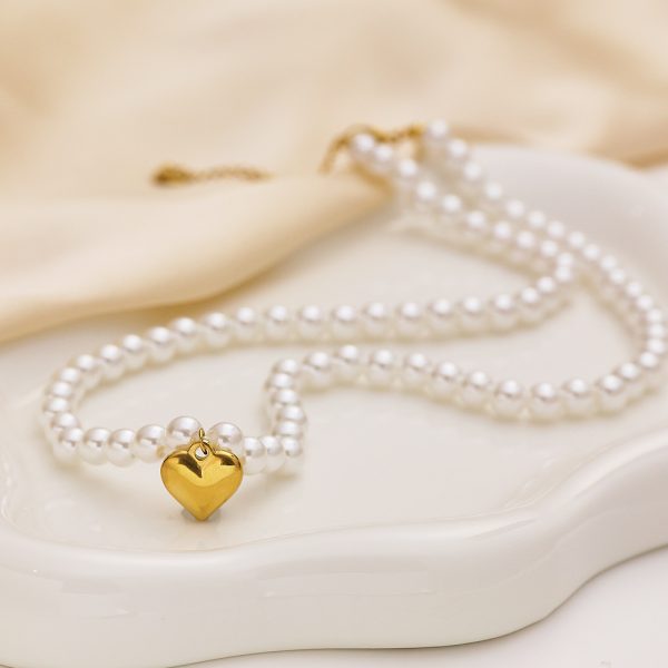 O1CN01x7vIh125wjVIV40jf_3529117591-0-cib.jpg Stainless Steel Pearl Heart Necklace 809918922800