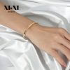 O1CN01yiM49L25wjbj4Wj4K_3529117591-0-cib.jpg Stainless Steel Engraved Open Bangle 564303271202