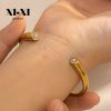 O1CN01zPlOYb25wjbpszpkk_3529117591-0-cib.jpg Stainless Steel Solitaire Cuff Bangle 857437076937